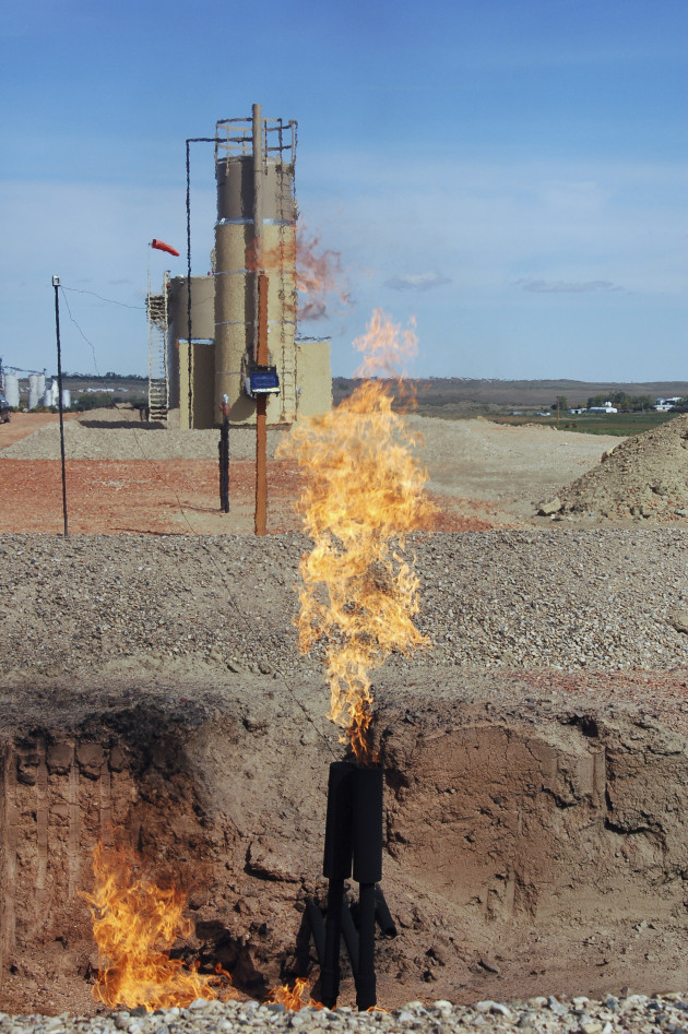  In this Sept. 23, 2008 file photo, natural gas is flared from an oil well near Parshall, N.D.  North Dakota is losing nearly $1 million monthly in natural gas tax revenue as vast amounts of the byproduct of oil production goes up in smoke, state tax department records show.  AP Photo/James MacPherson, File