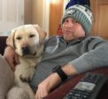 Tom Scheck and his dog, Marlowe, the sole Eagles fans during the Eagles' game against the Falcons on Jan. 13, 2018. (Photo courtesy of Colleen Scheck)